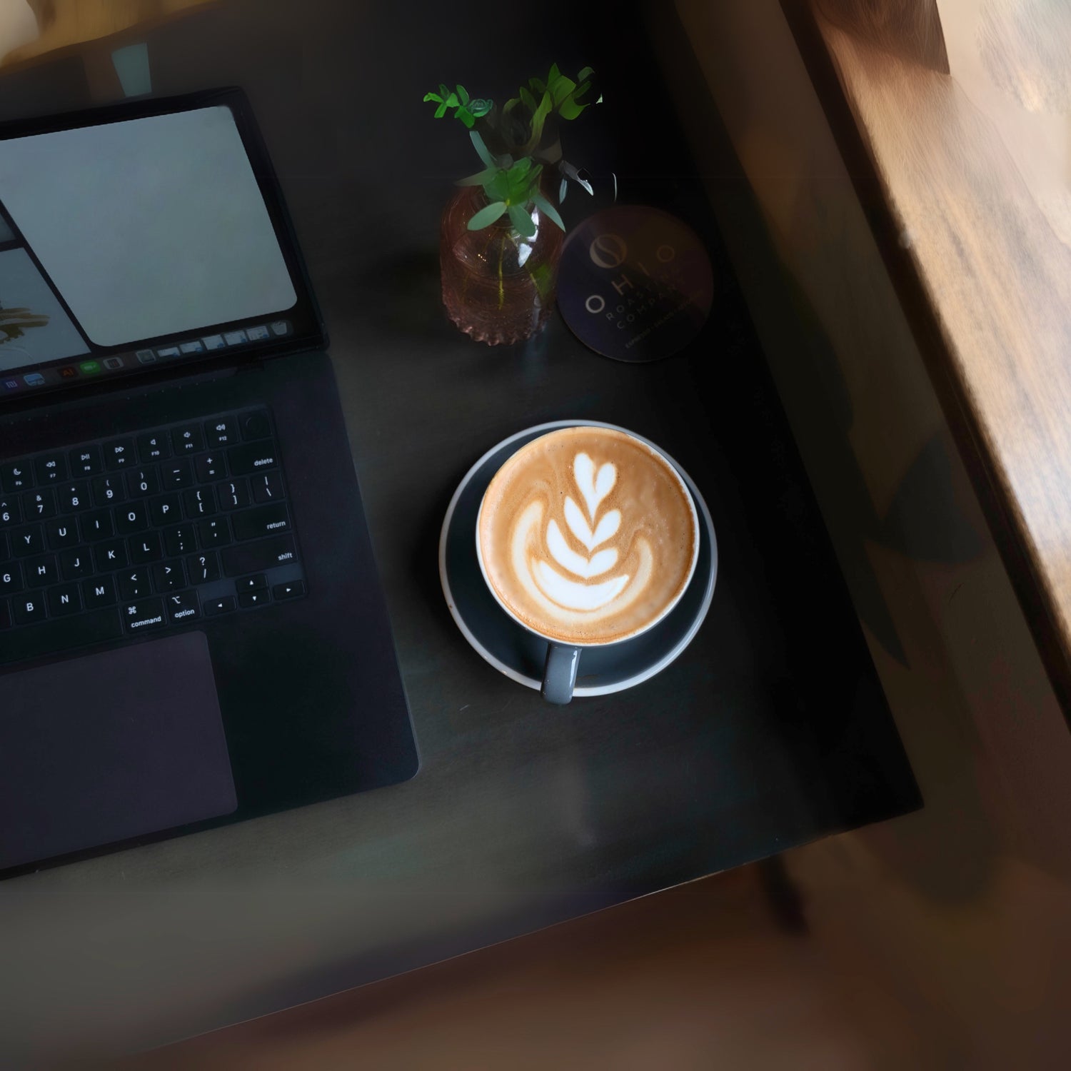 Latte Art near a computer